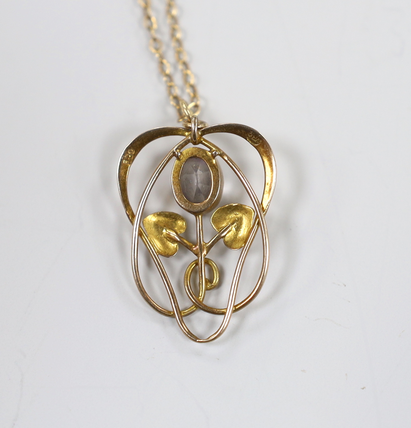 An Edwardian Art Nouveau 9ct and pale amethyst set pendant, on a 9ct chain, overall 52cm, gross weight 3.1 grams.